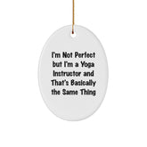 Yoga Instructor Gifts from Friends - Funny Oval Ornament for Christmas - 'I'm Not Perfect But I'm A Yoga Instructor And That's Basically The Same Thing' - Gifts for Yoga Instructors - Image 1